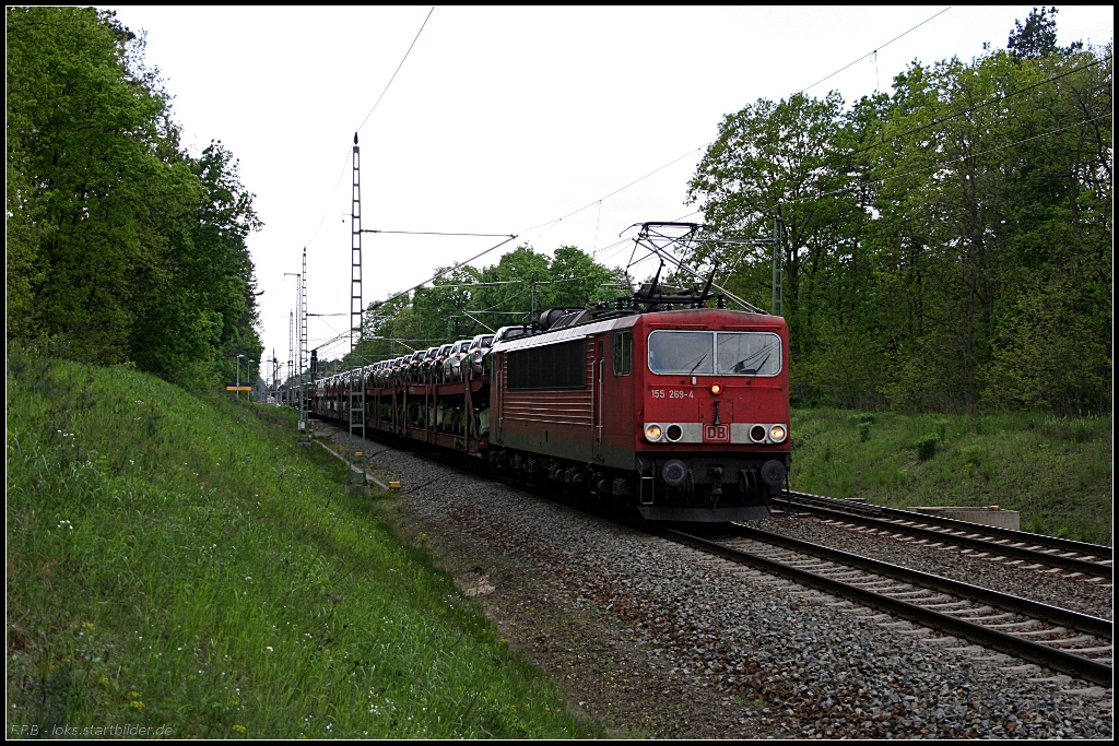 DB 115 269-4 mit neuen Autos Richtung FFO (gesehen Grnheide Fangschleuse 25.05.2010)