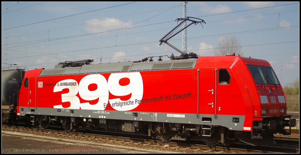 DB Schenker 185 399-3  399  in Berlin Schnefeld, 14.04.2012. Gebaut wurde die Lok im Jahr 2010 und ist die letzte Lok aus der Serie TRAXX F140 AC2 an die Gtersparte der DB AG. Daher trgt sie auch den Sticker  399  und den Schriftzug  DB Schenker & Bombardier  (NVR-Nummer 91 80 6185 399-3 D-DB)