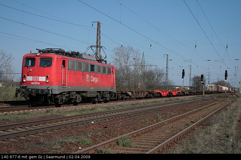 DB Schenker 140 677-6 und gemischtem Gterzug Richtung Seddin (Saarmund, 02.04.2009)
<br>
++ 15.11.2019 bei Bender, Opladen