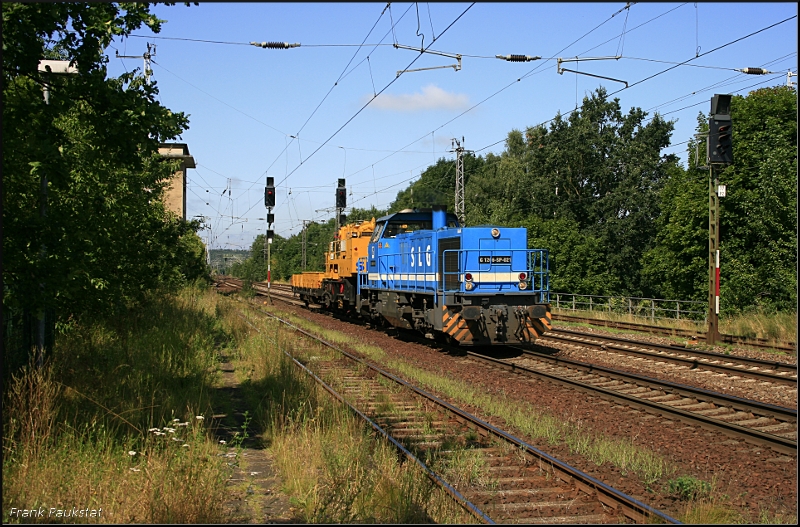 SLG G 1206-SP-021 mit Bauzug Richtung Genshagener Heide. Retoure mit Niederbordwagen (Saarmund, 05.08.2009)