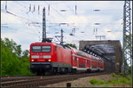 sachsen-anhalt/498754/db-regio-114-032-6-mit-dem DB Regio 114 032-6 mit dem RE nach Magdeburg Hbf am 21.05.2016 an der Kreuzung Elbebrcke in Magdeburg