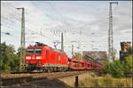 db-cargo/581351/db-cargo-185-149-2-fuhr-mit DB Cargo 185 149-2 fuhr mit leeren Autotransportwagen am 09.09.2017 am Abzweig Magdeburg Elbbrücke vorbei