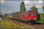 db-schenker/150877/db-schenker-155-218-1-mit-einem DB Schenker 155 218-1 mit einem gemischtem Güterzug (gesehen Berlin Karow 19.07.2011)