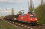 DB Schenker 145 040-2 mit gemischtem Gterzug am 27.04.2012 in Berlin-Karow