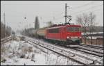 DB Schenker 155 055-7 mit einem Kesselwagenzug am 21.02.2013 Hhe Berlin-Karow