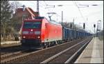DB Schenker 185 159 mit einem Kohle-Zug am 15.04.2013 in Wustermark-Priort