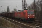 Railion 185 174-0 mit Eanos-x-Zug am 27.01.2012 in Berlin-Karow