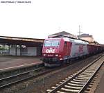 185 534-5 der Osthannoversche Eisenbahnen (OHE) durchfährt Bebra mit einem Holzzug am 14.07.2007