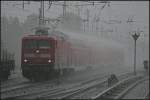 KW 21/72041/db-regio-112-186-2-eilt-mit DB Regio 112 186-2 eilt mit dem RE1 durch den Gewitterregen (gesehen Berlin Hirschgarten 24.05.2010)