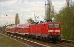KW 17/194023/db-regio-114-036-mit-dem DB Regio 114 036 mit dem RE3 nach Elsterwerda fährt am 27.04.2012 am S-Bahnhof Berlin-Karow vorbei