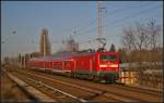 DB Regio 112 105 schiebt den RE3 Eberswalde Hbf am 04.03.2013 durch Berlin-Karow