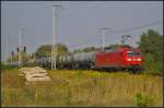 DB Schenker 145 033-7 mit einem Kesselwagen-Zug am 16.09.2014 durch die Berliner Wuhlheide