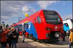 03-innotrans-2014-in-berlin/374019/stadler-flirt3-for-serbiabr-br-die Stadler FLIRT3 for Serbia.
<br /><br />
Die serbische eleznice Srbije (S) haben auf der InnoTrans 2014 in Berlin den bereits 2013 bestellten FLIRT3 vorgestellten elektrischen Triebzug vorgestellt. Insgesamt wurden 21 Zge fr den S-Bahn-Verkehr bestellt. Ausgestellt war 413 004-3 auf dem Freigelnde (NVR-Nummer 94 72 0 413 004-3 SRB-S)
<br /><br />
Daten: Spannung 25 kV/50 Hz, Hchstgeschwindigkeit 160 km/h, bis zu 3-fach-Traktion mglich, Sitzpltze 234, Multifunktionsabteile, Nachrstung auf ETCS 2 mglich.
