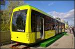 03-innotrans-2014-in-berlin/374098/omnitram-electron-low-flor-lrv-for-lviv OmniTram Electron Low-flor LRV for Lviv, Ukraine.

Heckansicht der von den Herstellern Transtec F&E Vetschau und Electron, Ukraine für die Stadt Lviv gebauten Straßenbahn, Typ Electron T3L44. Es handelt sich hier im eine Vorserie, von denen zwei fahren sollen. Die Tram ist 19.5 m lang, besteht aus 3 Modulen und eine Spurbreite von 1000 mm. Insgesamt haben 160 Passagiere Platz, in der 7-Modul-Variante bis zu 215 Passagiere. Ausgestellt war die Tram auf der Freigelände der InnoTrans 2014 in Berlin.
