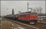 DB Schenker 155 120 mit einem Kesselwagenzug am 12.02.2013 Hhe Berlin-Karow
<br><br>
Update: 12.02.2015 in Opladen verschrottet