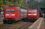 Zweimal Fernverkehr: Auf Gleis 101 steht DB 101 111-3 mit dem IC 2348 nach Dsseldorf, auf Gleis 102 schob 120 130-0 den IC 2376 nach Stralsund Hbf am 05.09.2014 zum Halt in den Bahnhof Uelzen   