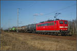 (Archiv) Die blitzblanke DB Schenker 151 008-0 war mit einem Kesselwagenzug am 22.03.2012 in der Berliner Wuhlheide unterwegs.