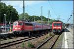 DB 115 332-9 steht nach dem Umsetzen der Lok auf Gleis 8 und muss erst noch DB 114 016-9 mit dem RE 1 nach Frankfurt (Oder) passieren lassen (gesehen Berlin Wannsee 03.06.2010 - Update 115 332-9: