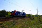 TXL Re 482 034-6 kommt direkt aus der Sonne (Angemietet von SBB Cargo, sub type CH/D, gesichtet Berlin Wuhlheide 24.04.2009).