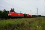 RAILION Logistics 145 062-6 mit Container-Zug bei trben und regnerischem Wetter unterwegs (DB Schenker Rail Deutschland AG, gesichtet Berlin Wuhlheide 18.07.2009 - Update: In Rostock-Seehafen zI;