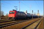 HGK 185 586-5 mit Kesselwagen am 26.02.2012 in Berlin Schnefeld-Flughafen.