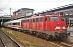 DB AutoZug 115 293-3 mit PF 2670 aus Warnemnde in Berlin Gesundbrunnen, 17.06.2012.