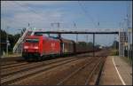 DB Schenker 185 269-8 mit einem gemischtem Gterzug am 24.07.2012 in Nuthetal-Saarmund