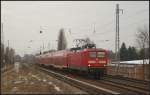 DB Regio 112 101 mit dem RE3 nach Elsterwerda am 12.02.2013 Hhe Berlin-Karow