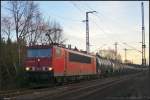 DB Schenker 155 048 mit Zans-Wagen am 06.02.2014 in der Berliner Wuhlheide