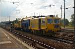 Plasser & Theurer UNIMAT 09-475/4S mit SSP 100 im Einsatz bei der Gleisbau-Busching-Wagner GmbH (GBW) am 07.09.2014 durch den Bahnhof Berlin Schnefeld Flughafen (NVR-Nummer 99 80 9424 003-8 D-GBW)