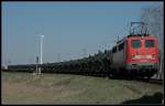 DB Schenker 140 070-2 mit Y-Transport in der Verbindungskurve nach Seddin, noch einmal schn von Nah (gesehen Ludwigsfelde Genshagener Heide 07.04.2010)