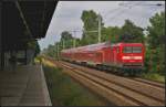 DB Regio 112 122 mit dem RE3 Stralsund Hbf  FahrradExpress  am 16.06.2014 durch Panketal-Rntgental