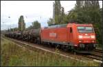 DB Schenker 185 166-6 mit kurzem Kesselzug am 30.08.2011 in Berlin-Karow