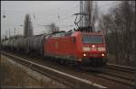 DB Schenker 185 099-9 mit Kesselzug am 27.01.2012 in Berlin-Karow.