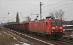 DB Schenker 145 069 mit einem Leerzug am 12.02.2013 Hhe Berlin-Karow