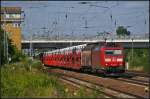 DB Schenker 185 148 mit dem Volkswagen-Zug am 07.07.2013 in Berlin Schnefeld Flughafen