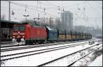 DB Schenker 185 061-9 mit einen Zug Falns-Wagen der PKP Cargo nach Ruhleben (DGS 49428; Berlin Greifswalder Str, 30.12.2009)