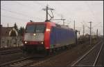 TWE 185-CL 003 / 185 503 mit einem Containerzug durchfährt am 26.11.2011 den S-Bahnhof Halle Messe